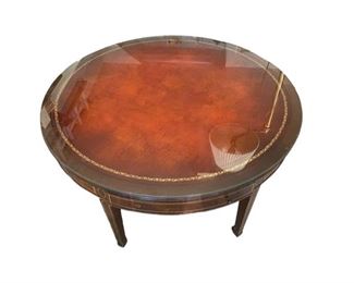 $50 - Two Drawer (Front and Back) Mahogany Round Occasion Table CG97-21                                                                            Classically styled round mahogany side table standing on tapered legs. Contrasting light figured inlay throughout. The drawer is finished with a bronze handles. One handle is missing. Glass top. 

Width : 35,5
Height : 16

Local pickup Potomac, MD.  Contact us for shipper suggestions.