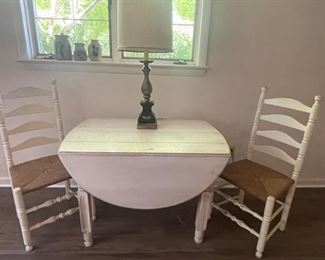 Farmhouse Chic? Nice old table and chairs...