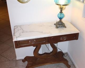 lyre-base marble top table, two drawers