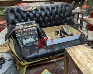 This buggy seat is ready to giddy up. And as original paint of yellow with black leather seat, it is a smart, fun, functional antique.