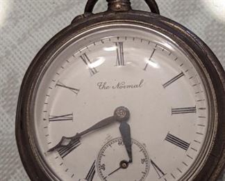 A. Vintage pocket watch