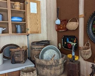 An amazing shape would wash tub. Also shoe form with child and adult footing. Not to forget the antique baskets and enamelware.
