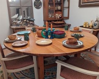 Amazing antique red pine table with bun feet and center lazy Susan . Absolutely pristine condition.