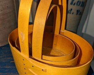 Shaker yellow nesting baskets waiting to pick summer blueberries.