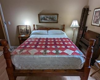 Beautifully turned four poster antique early 19th century rope bed. Antique, quilt and tatted bedspread.