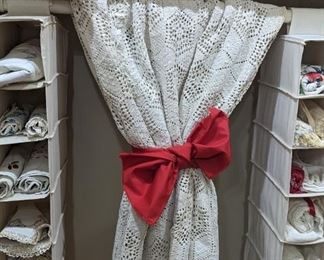 So many vintage bedspreads white and crisp showcase with an antique quilt that gives a pop of color.