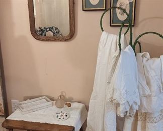 Precious primitive table with screw and legs. Very cute rag rug.