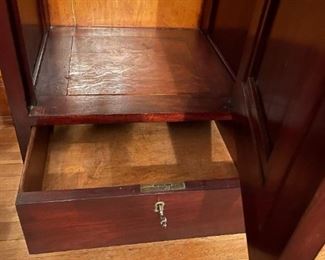 Antique Wood Cabinet with Carved Cherub Scene