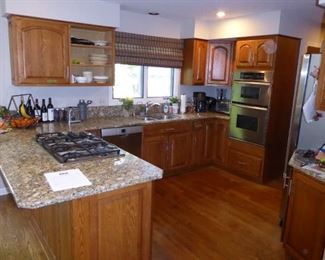 All cabinets with Granite, sink, faucet and disposal, Desk and Wet Bar $1,450.00. Doesn’t include the appliances.