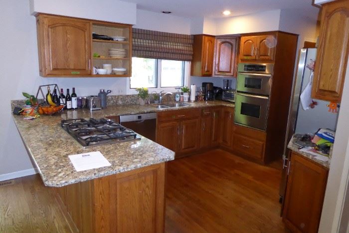 All cabinets with Granite, sink, faucet and disposal, Desk and Wet Bar $1,450.00. Doesn’t include the appliances.