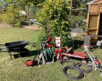 Black & Decker Edge Hog, B&D Grass Hog, Wheel Barrow,Craftsman Electric Chainsaw, Row Seeder,  Garden Hoses and Reel