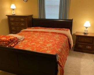 Queen Sleigh Bed suite: bed 62.5”w 87”L 44” t headboard, dresser w mirror 66”w 19” d 75.5” t, chest of Drawers 38” w 19.5” d 47.5”t (1) nite stand 26.5”w 16” d 24.5” t.     Whole set $350.00