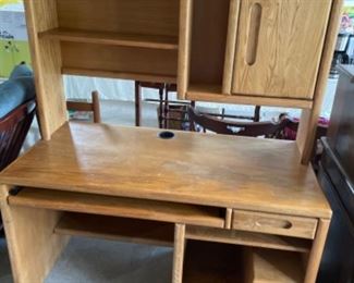 2 piece oak desk: 49”w 24” d desk top 29” t with top 65” tall
$150.00