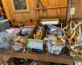 Assorted tools, light bulbs, antlers