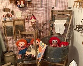 Raggedy Ann and Andy dolls, butter church, wash wringer stand, etc. 