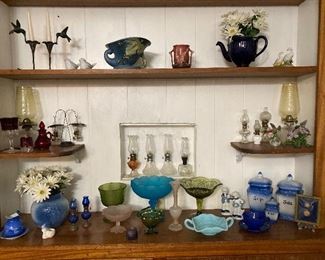Roseville, oil lamps, colored glass, flow blue canisters, etc.