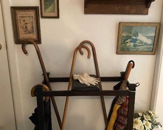 umbrella stand, canes, umbrellas, vintage wall art, antique mirror