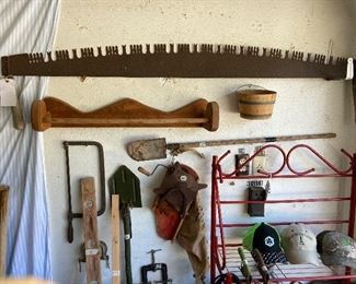 two-man tree saw, red baker's rack, vintage tools