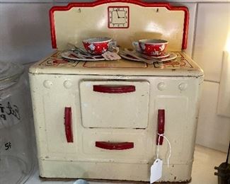 Wolverine child's stove, Ohio Art child's tin litho dishes and utensils