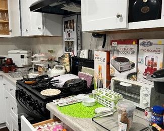 Bread maker, food processor, coffee kettles, toaster oven, cookie cutters