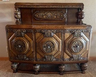 Wow! This solid wood, intricately hand carved sideboard/buffet is just gorgeous!  Measures 54" tall x 60" wide x 23" deep - a must see!