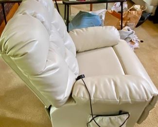 Like New White Vegan Leather Power Recliner and Lift Chair with Wired Remote Control.