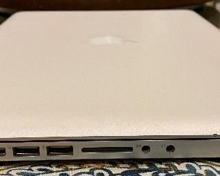 Late 2010 15.4" MacBook Pro 4GB, 320GB HDD with Box and packing material.  Fresh macOS Sierra.