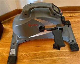 Floor Exercise Machine with Digital Read-out and Adjustable Tension while sitting down.  Keep those legs working. 