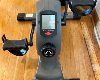 Floor Exercise Machine with Digital Read-out and Adjustable Tension while sitting down.  Keep those legs working.  