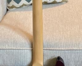 Beautiful Schecter Diamond Series Electric Guitar. Color: Walnut with Maple, Rose Wood and Basswood
Neck is Maple with a Solid body Electric Guitar,
2 Humbucking Pickups,  Rosewood Fingerboard.  Includes a custom case made for this guitar.