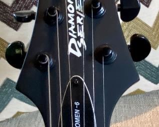 Beautiful Schecter Diamond Series Electric Guitar. Color: Walnut with Maple, Rose Wood and Basswood
Neck is Maple with a Solid body Electric Guitar,
2 Humbucking Pickups,  Rosewood Fingerboard.  Includes a custom case made for this guitar.