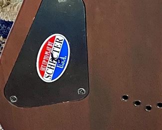 Beautiful Schecter Diamond Series Electric Guitar. Color: Walnut with Maple, Rose Wood and Basswood
Neck is Maple with a Solid body Electric Guitar,
2 Humbucking Pickups,  Rosewood Fingerboard.  Includes a custom case made for this guitar.