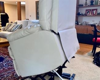 Like New White Vegan Leather Power Recliner and Lift Chair with Wired Remote Control.