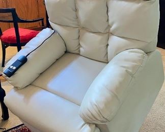 Like New White Vegan Leather Power Recliner and Lift Chair with Wired Remote Control.