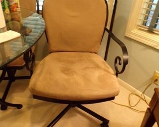 glass topped table & 4 of these chairs w/rollers