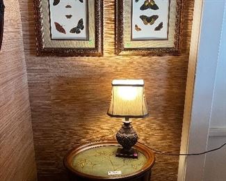 Beautiful pictures of butterflies and barrel table with nice lamp!