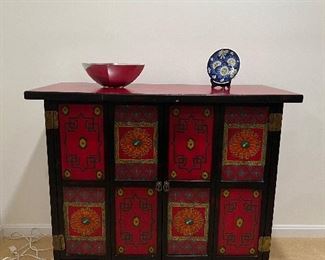 Asian inspired wooden 2 door console table with red top