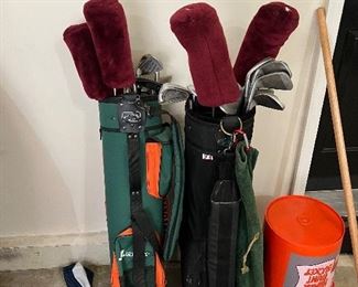 2 Sets of golf clubs with bags