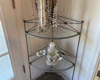 Metal corner stand and some jewelry available at 30% discount Sunday 12-4. 