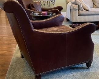 Pair of Henredon leather upholstered club chairs with nailhead trim. Each measures 32" W x 42" D. Photo 3 of 5. 