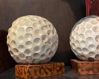 Pair of golf ball bookends. 