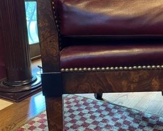 Pair of William Switzer oxblood leather upholstered tub chairs with nailhead trim. Each measures 27" W x 29" D x 41" H. Photo 2 of 3. 