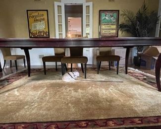 Vintage William Switzer Mahogany Dining Table. Measures 86" - 125" W x 47" D. Comes with two 20" leaves and pads.  Photo 1 of 4. 
