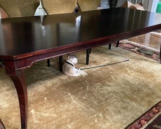 Vintage William Switzer Mahogany Dining Table. Measures 86" - 125" W x 47" D. Comes with two 20" leaves and pads.  Photo 2 of 4. 