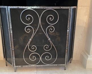 Decorative antique fireplace screen. Measures 32" W x 24" H. 