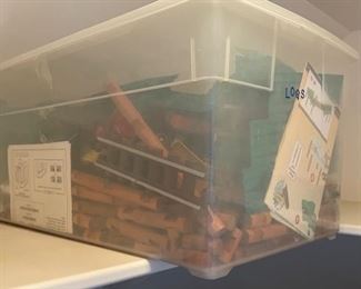 Storage Bin of Lincoln  Logs. 