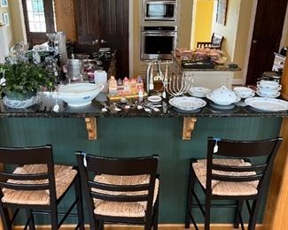 One of the pairs of bar stools and Judaica