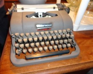 Curvy 1950's Underwood Champion Typewriter