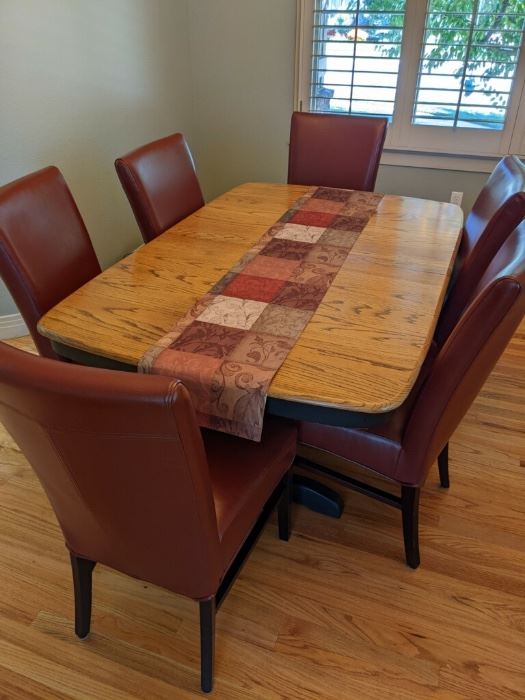 Dining table, six chairs and two leaves 