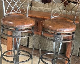Two leather seated barstools